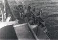 u-boat crew alongside Nene standing on coning tower