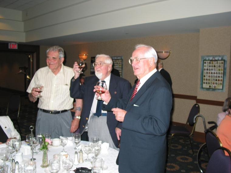 John Inglis Ron Graham Howard Elliott toast